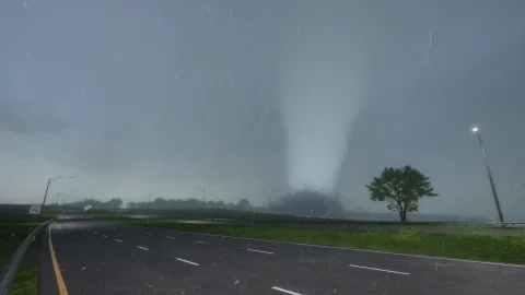 A wide tornado in heavy rain past a two-lane highway, a speed limit sign and a lone tree
