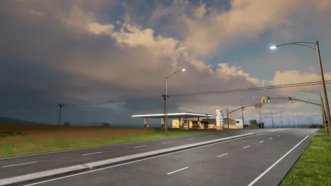 A lit gas station beside a highway at dusk, a storm base and rain shaft filling the sky behind it